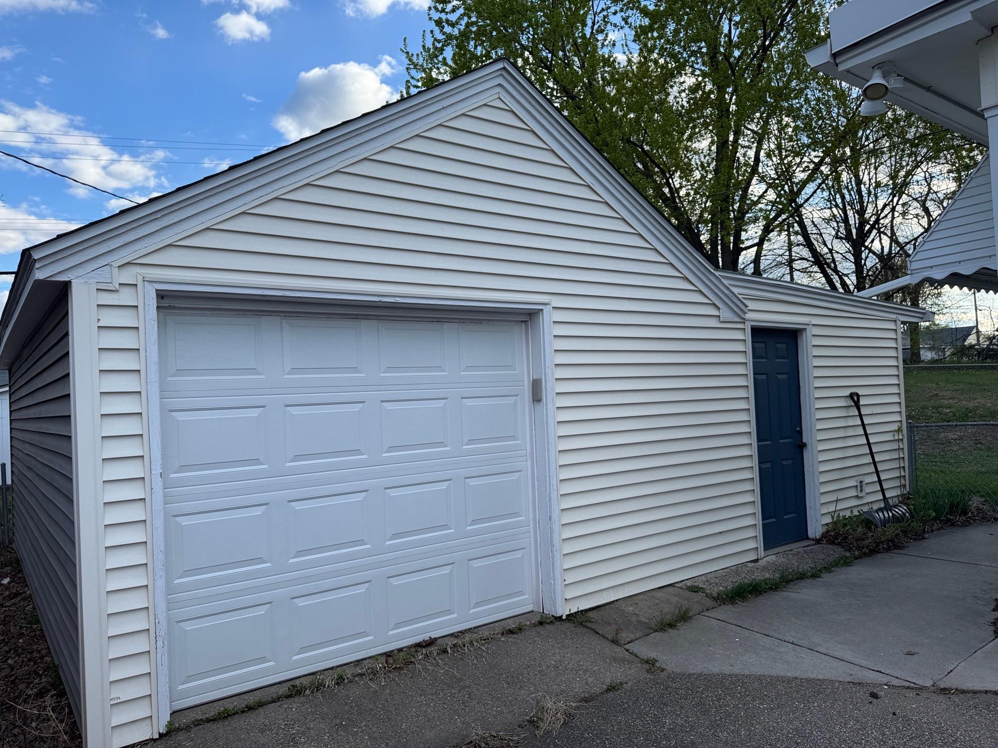 Garage with additional Storage Area.