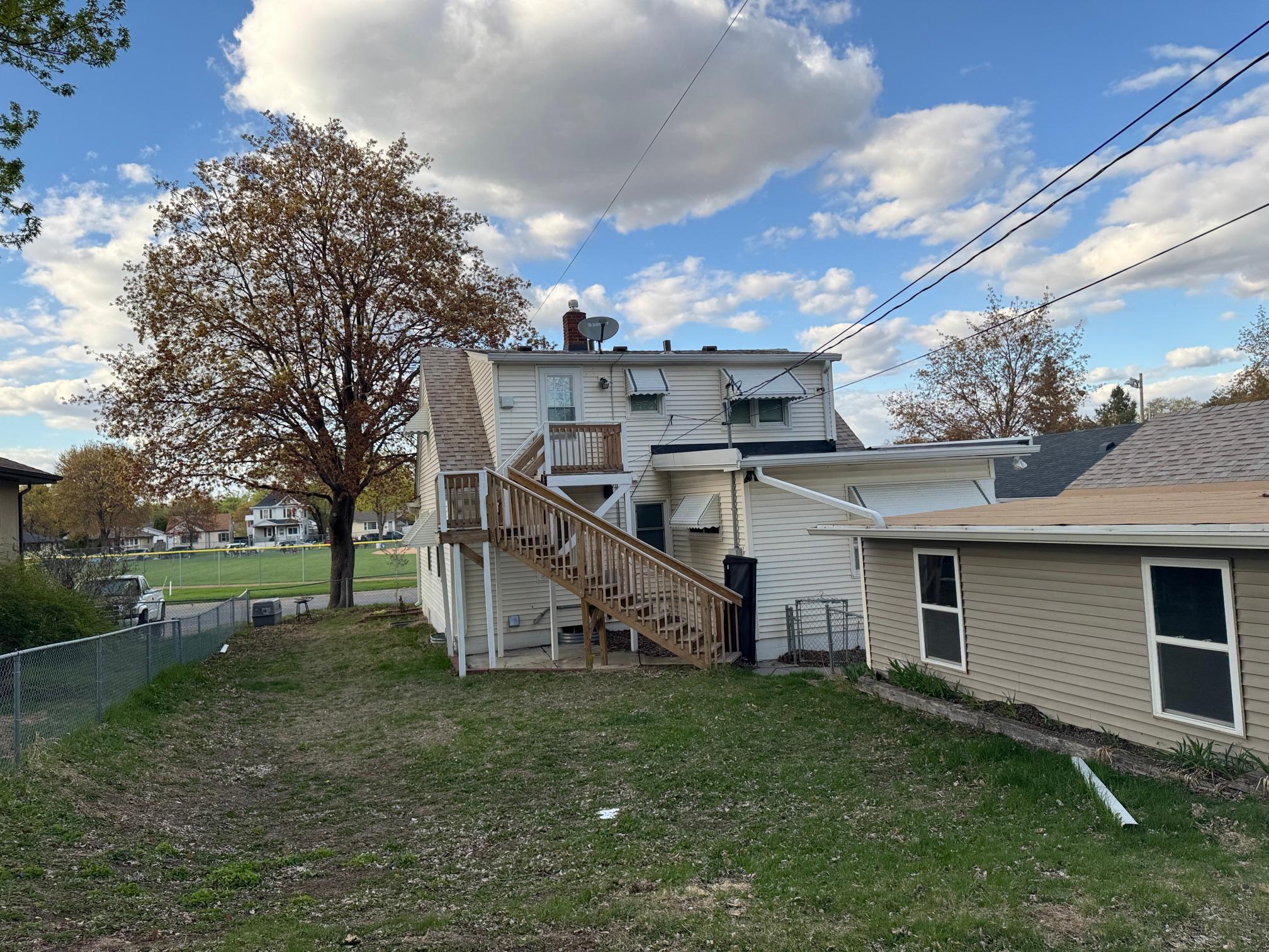 South Side of home. Entry to upper unit.