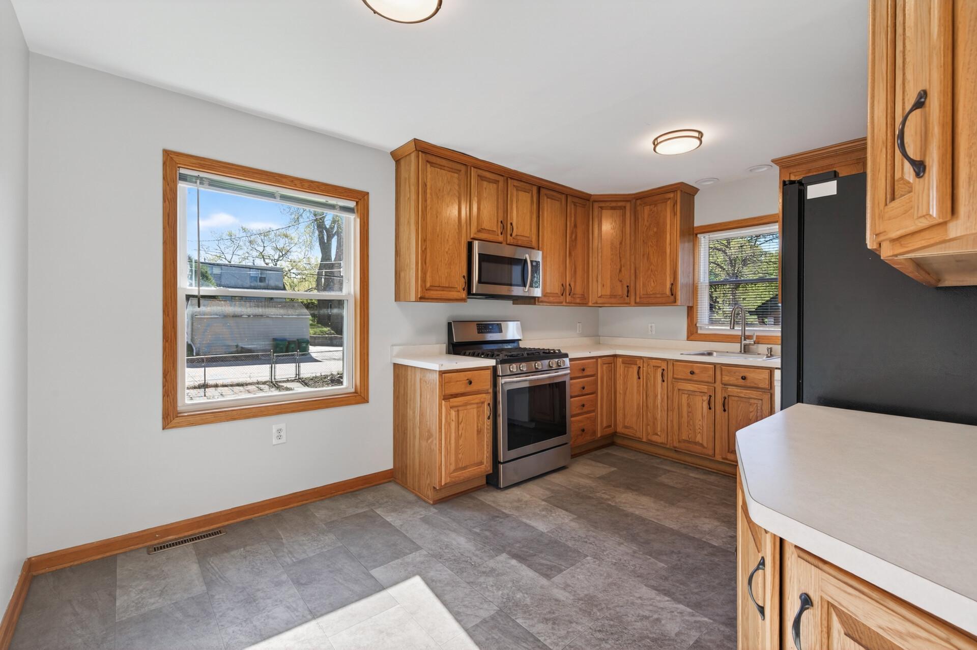 Tons of natural light in this kitchen! Enjoy the eat in kitchen space!