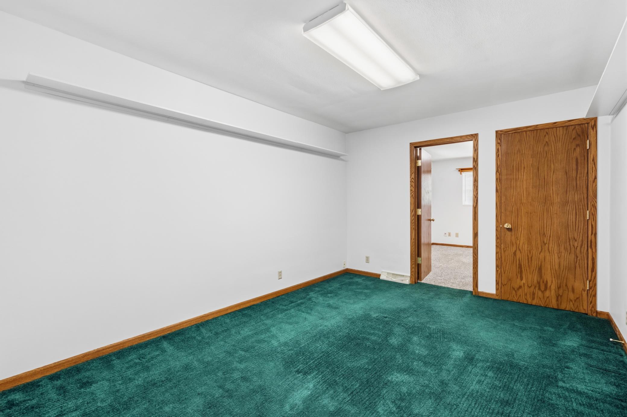 Den or office off one of the main floor bedrooms.jpg