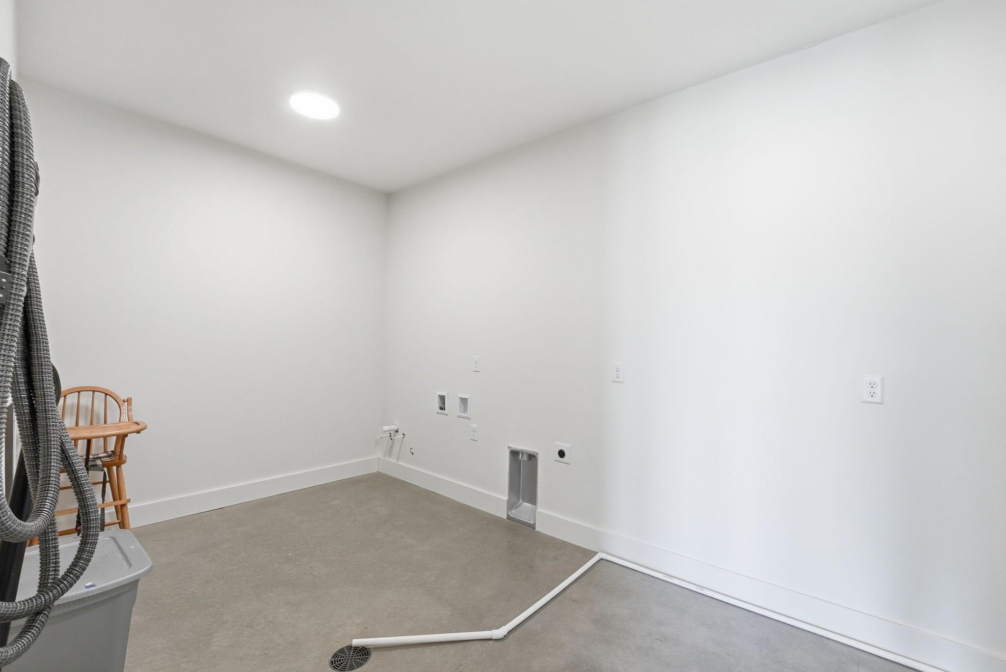 Main Level Bonus Room-Has Laundry Hook Up. Multi Use Room!