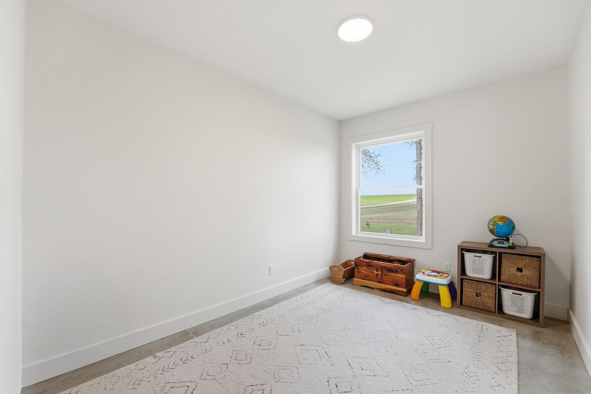Playroom on the Main Level. Could be used as office space or additional bedroom!