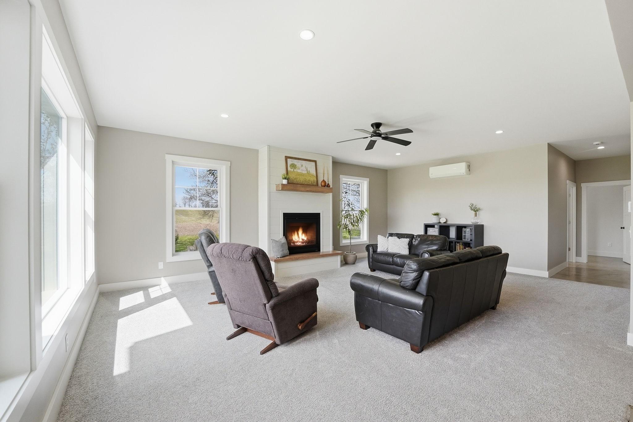 Beautiful spacious family room with gas fireplace. A part of the new addition!