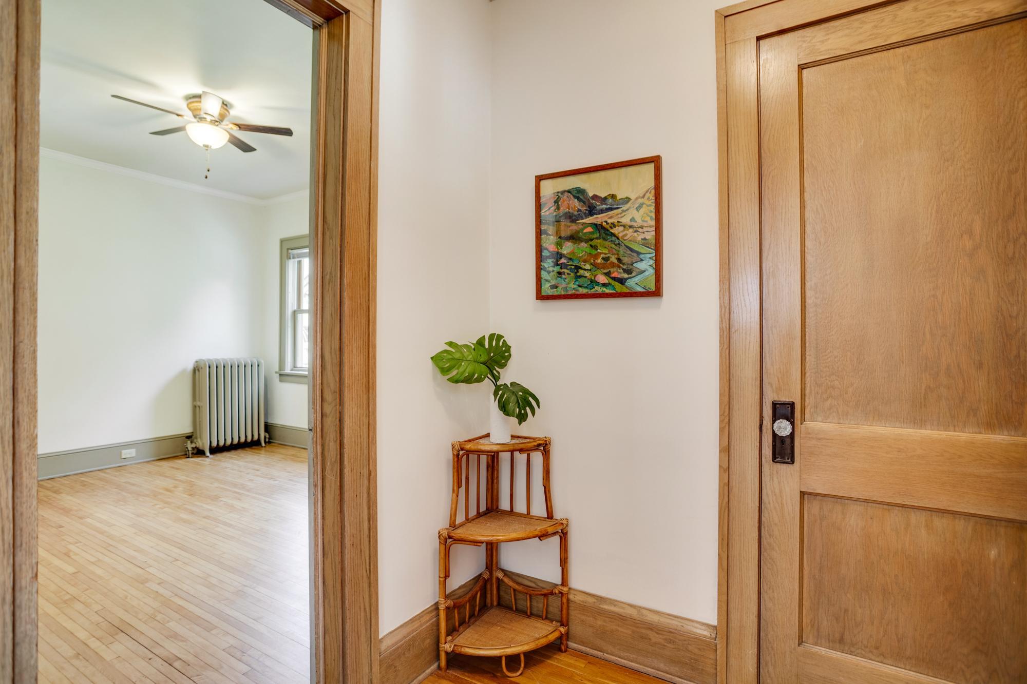 Foyer into the main floor first bedroom