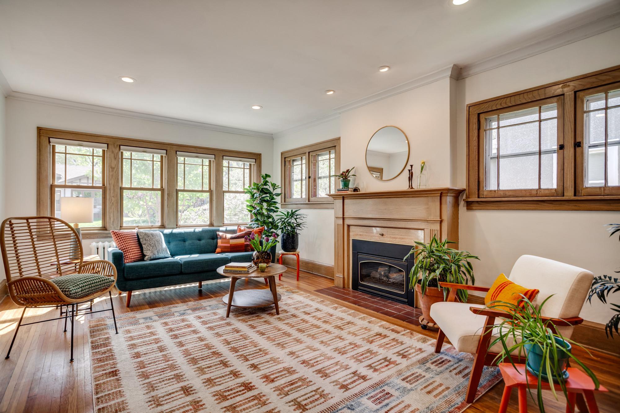 Large living room with south and east facing windows for loads of natural light
