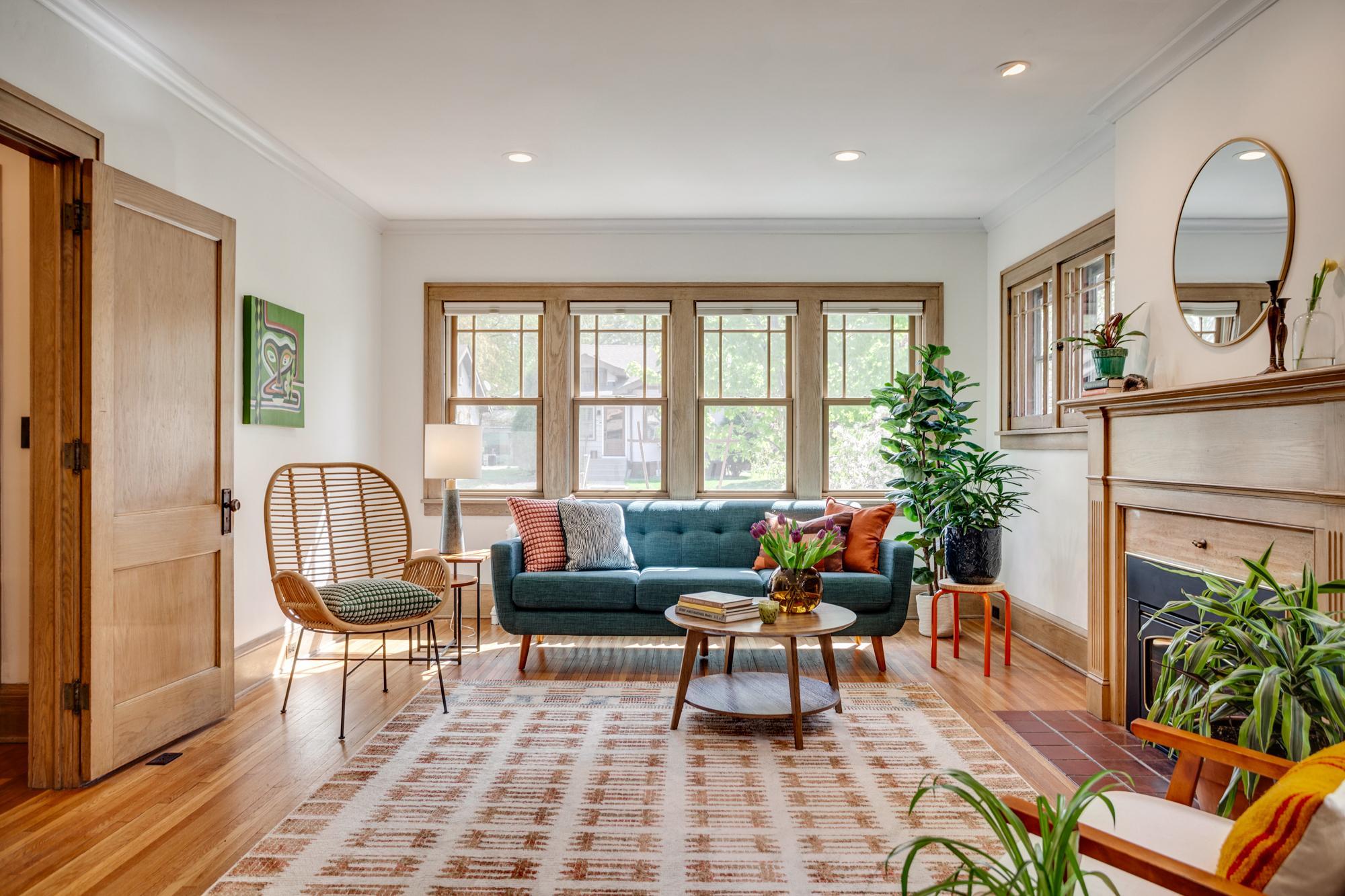 Large living room with south and east facing windows for loads of natural light