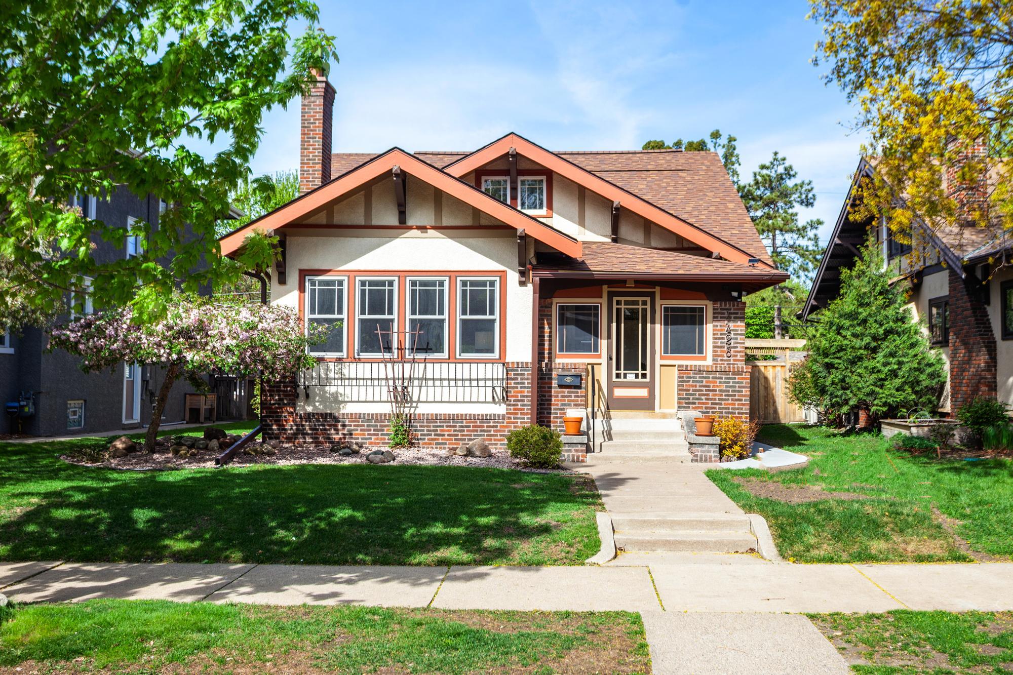 Welcome home to 4428 Garfield Ave, a classic 1920 Craftsman style bungalow