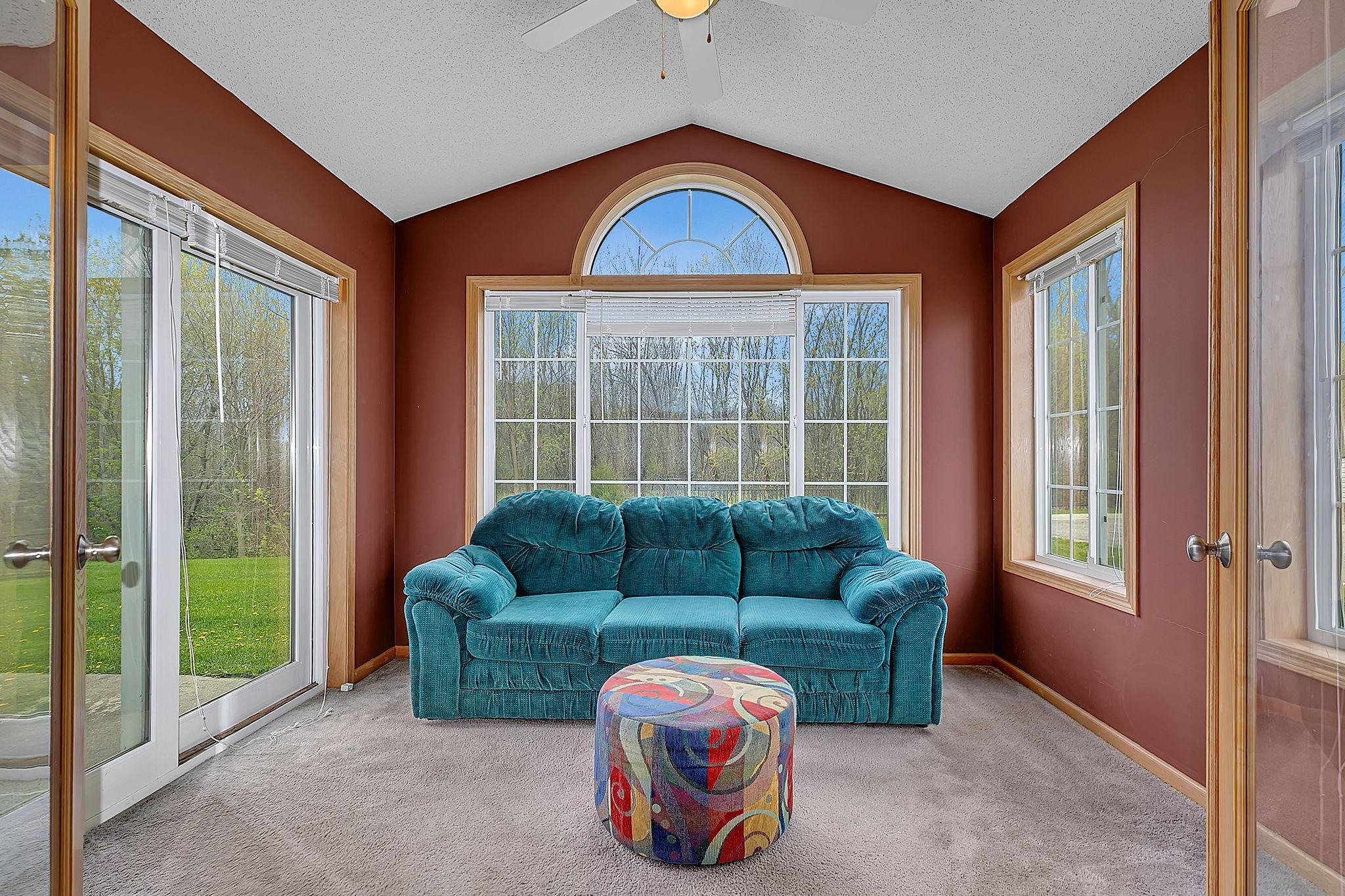 Sunroom looking out at wooded area