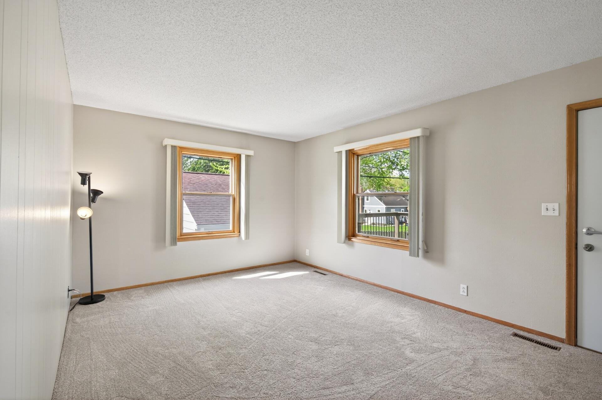 New carpet in living room AND hardwood floors under the carpet