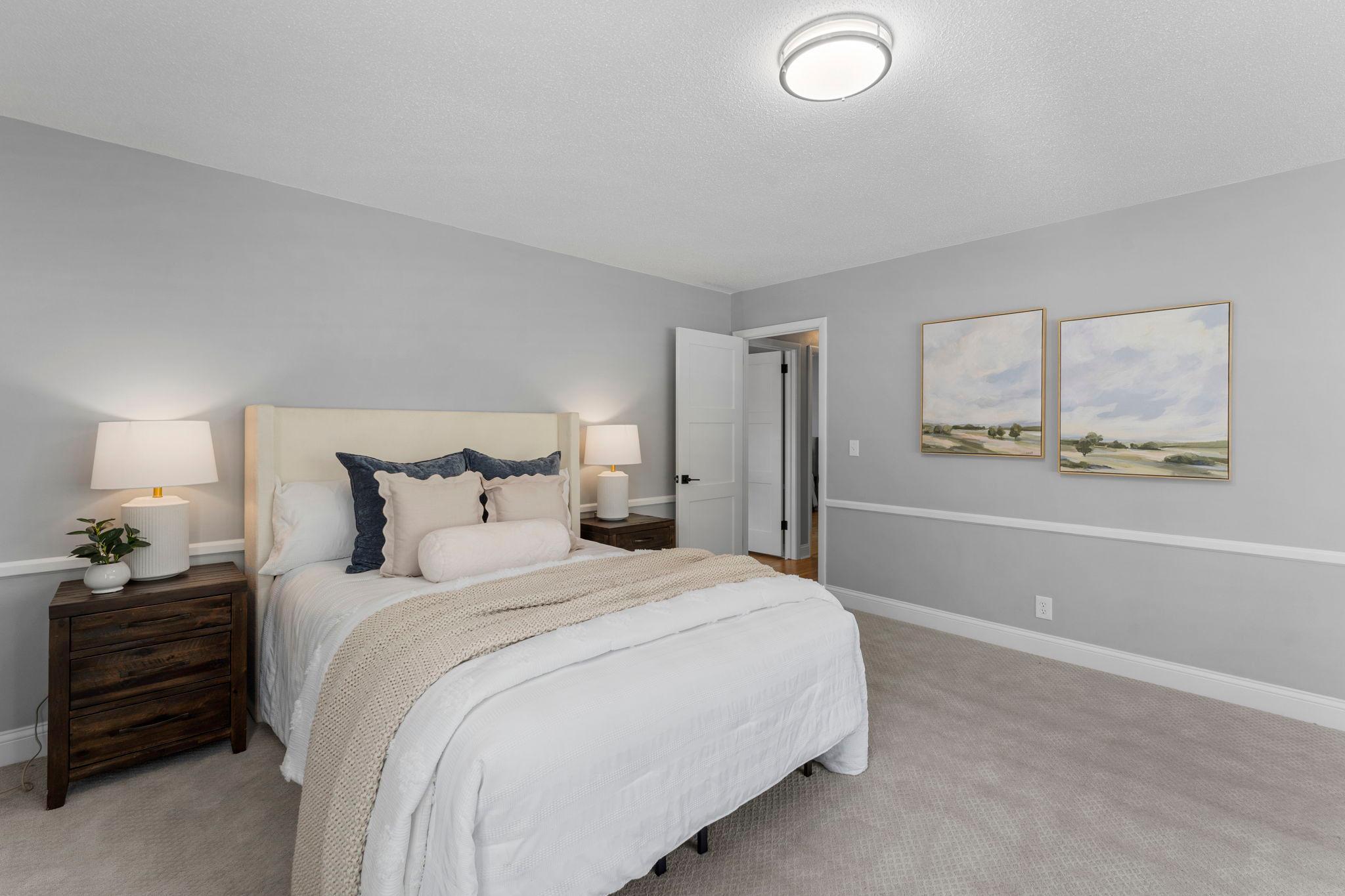 Three well-sized bedrooms are located on the main level, including a spacious primary suite.