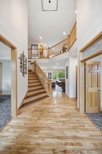Beautiful rich red birch floors lead into a massive foyer, giving the home a true sense of grandeur.â
If you meant brick instead of birch, you could say