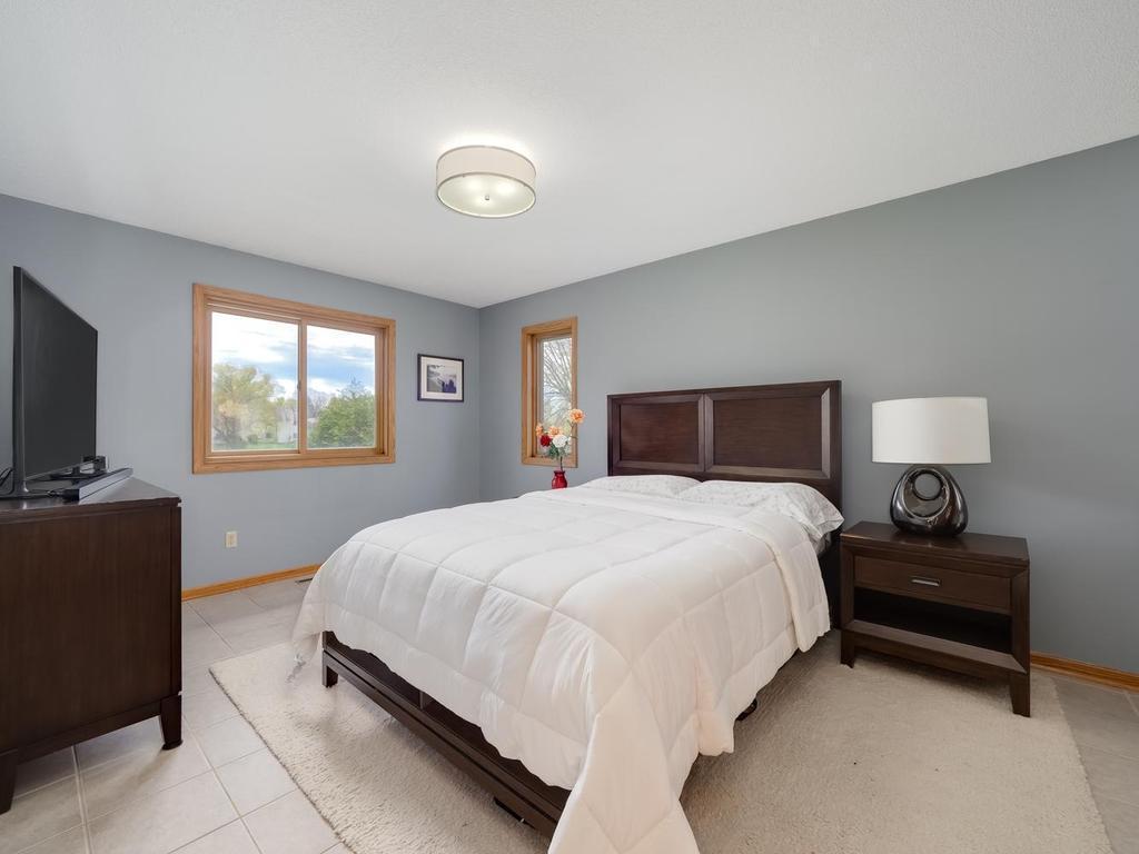 Primary suite, upper level with walk in closet ceramic flooring