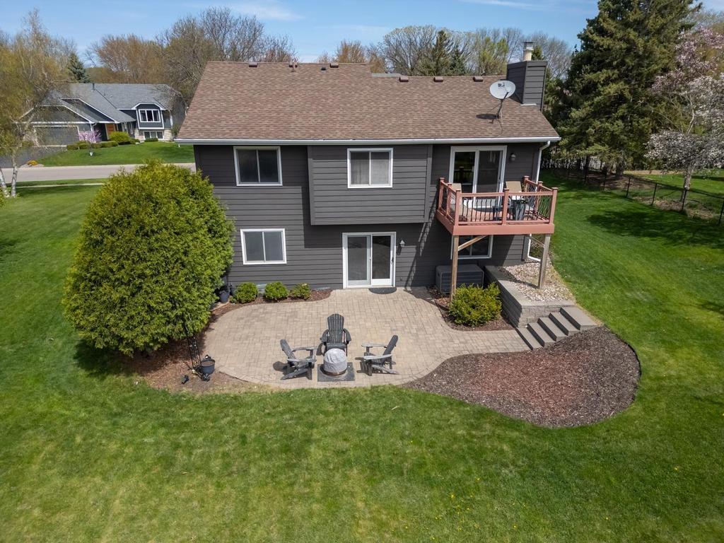 Shot of the back of the home showing the beautiful landscaping
