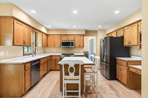 Kitchen with stainless steel appliances and center island