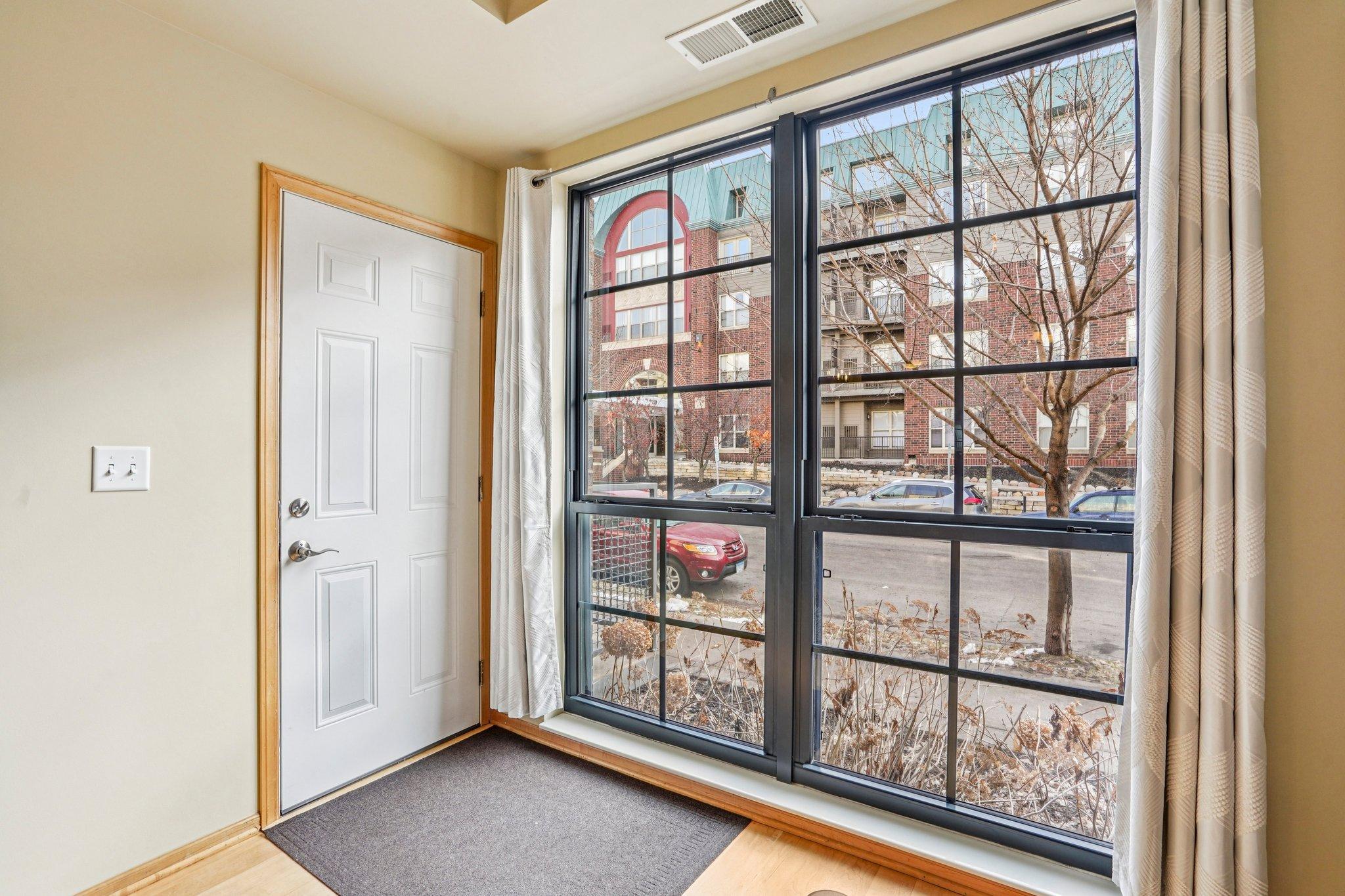 Floor-to-ceiling windows make the condo look bright!