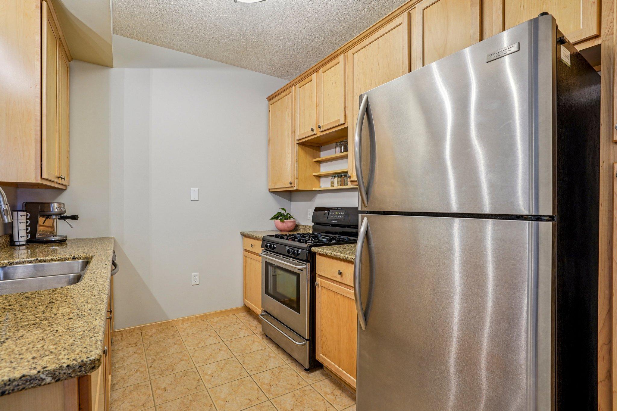 Kitchen with stainless-steel appliances