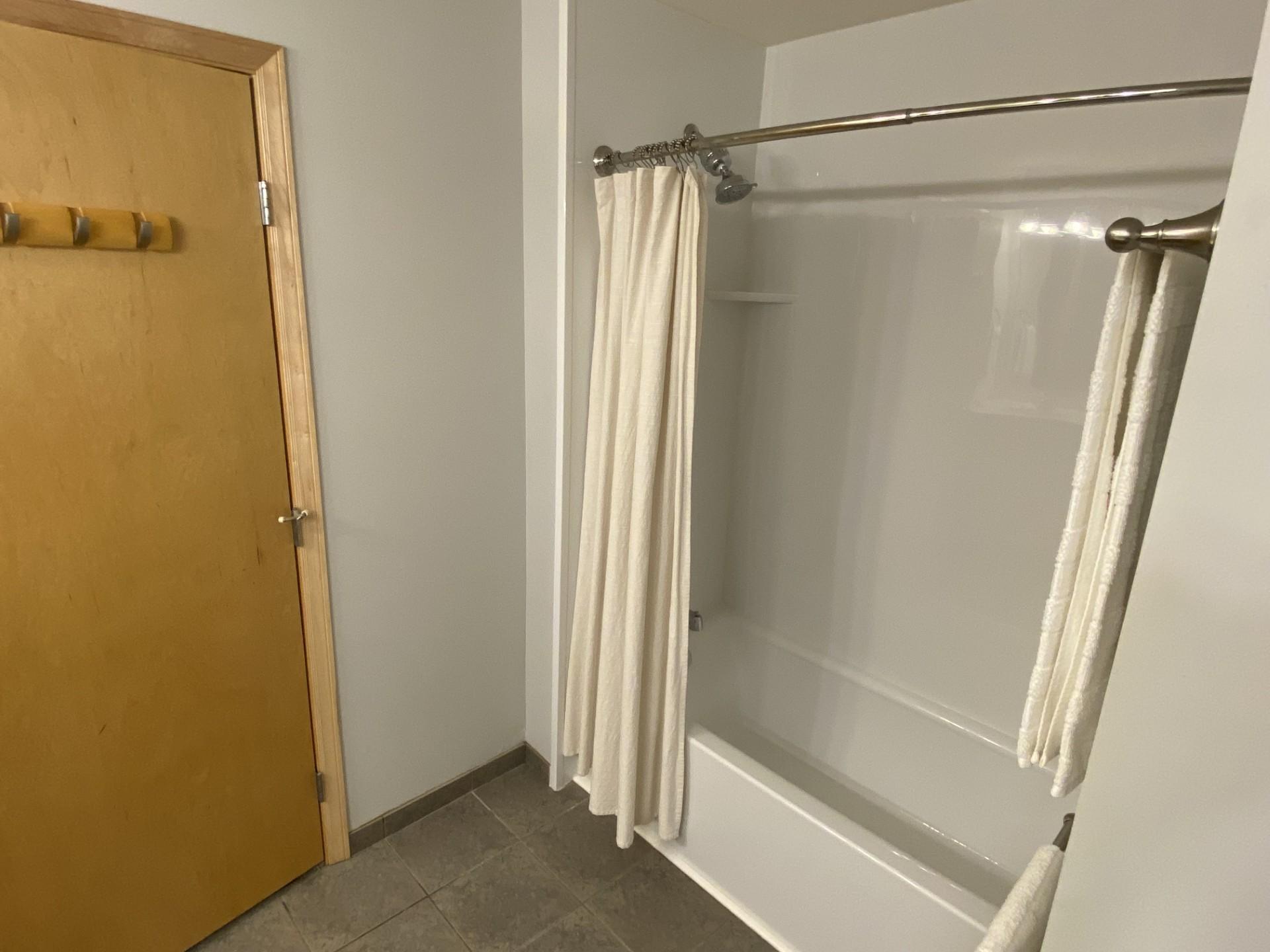 Bathtub & shower surround, owner's suite BA