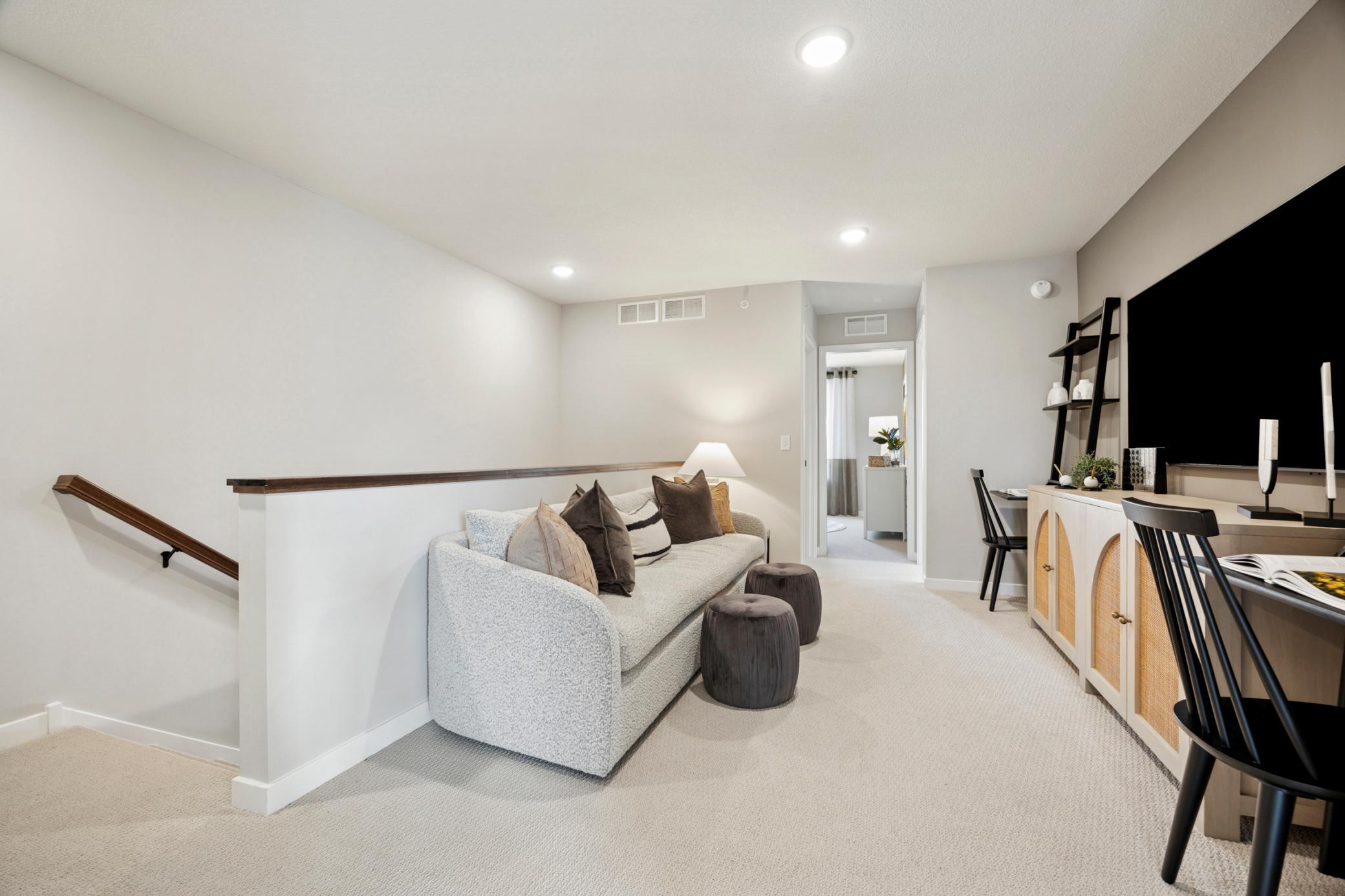 Welcome to the loft! Generously sized and the perfect space to start and end your day! Pulte - 9301 Larimar Trail_Photos are of the model home. Finishes may vary.