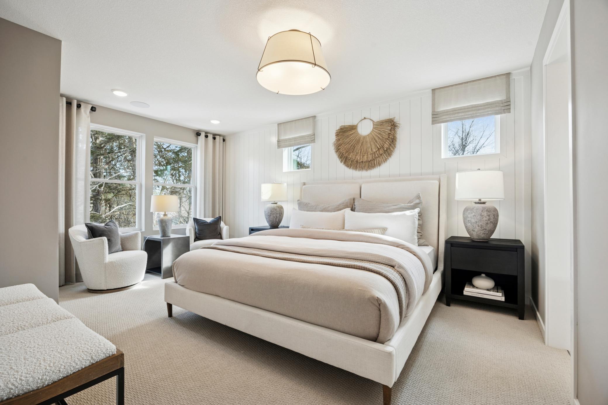 Spacious and serene, this primary bedroom offers a relaxing retreat at the end of the day. With generous square footage, soft natural light, the room promotes both rest and quiet moments of retreat, Pulte - 9301 Larimar Trail_019.jpg