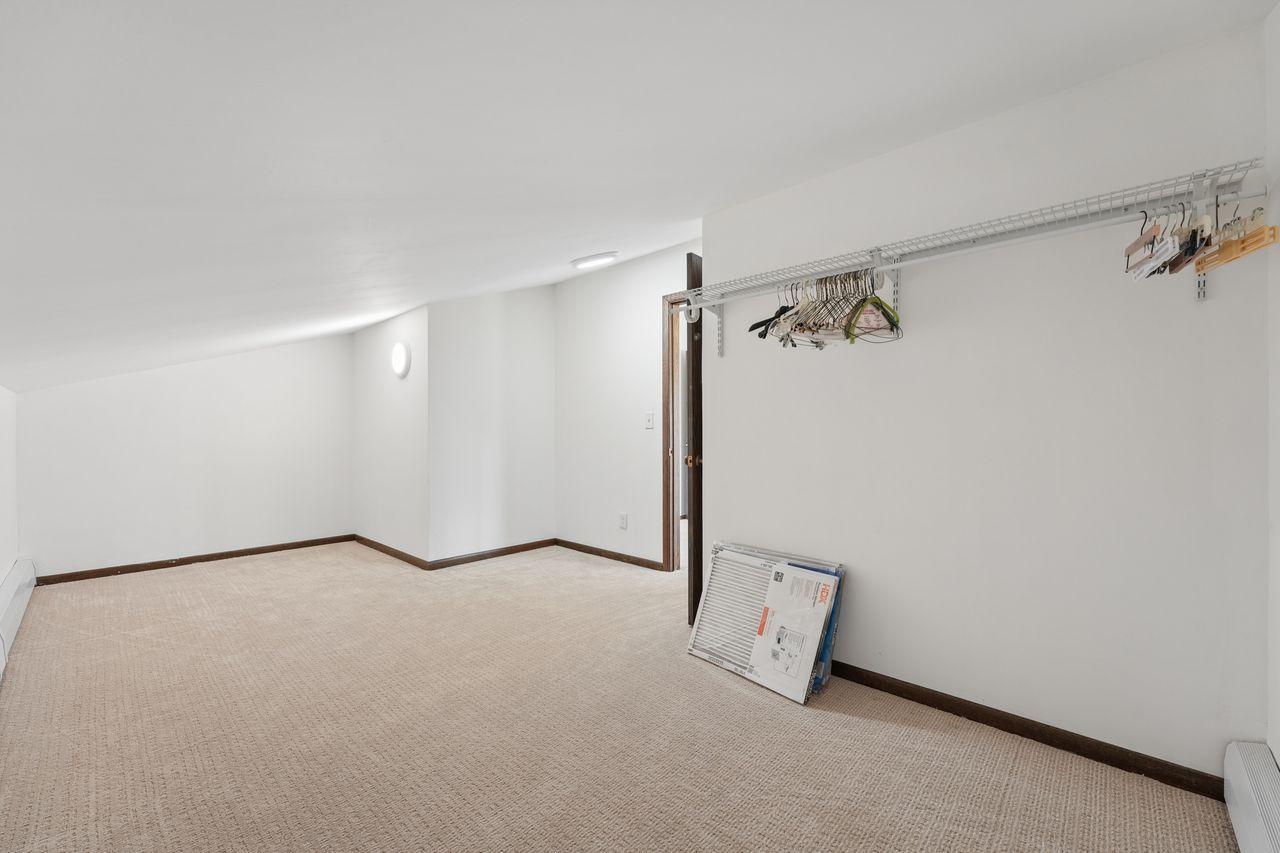 Upstairs 2nd bedroom with LARGE walk in closet, extra room for added storage.