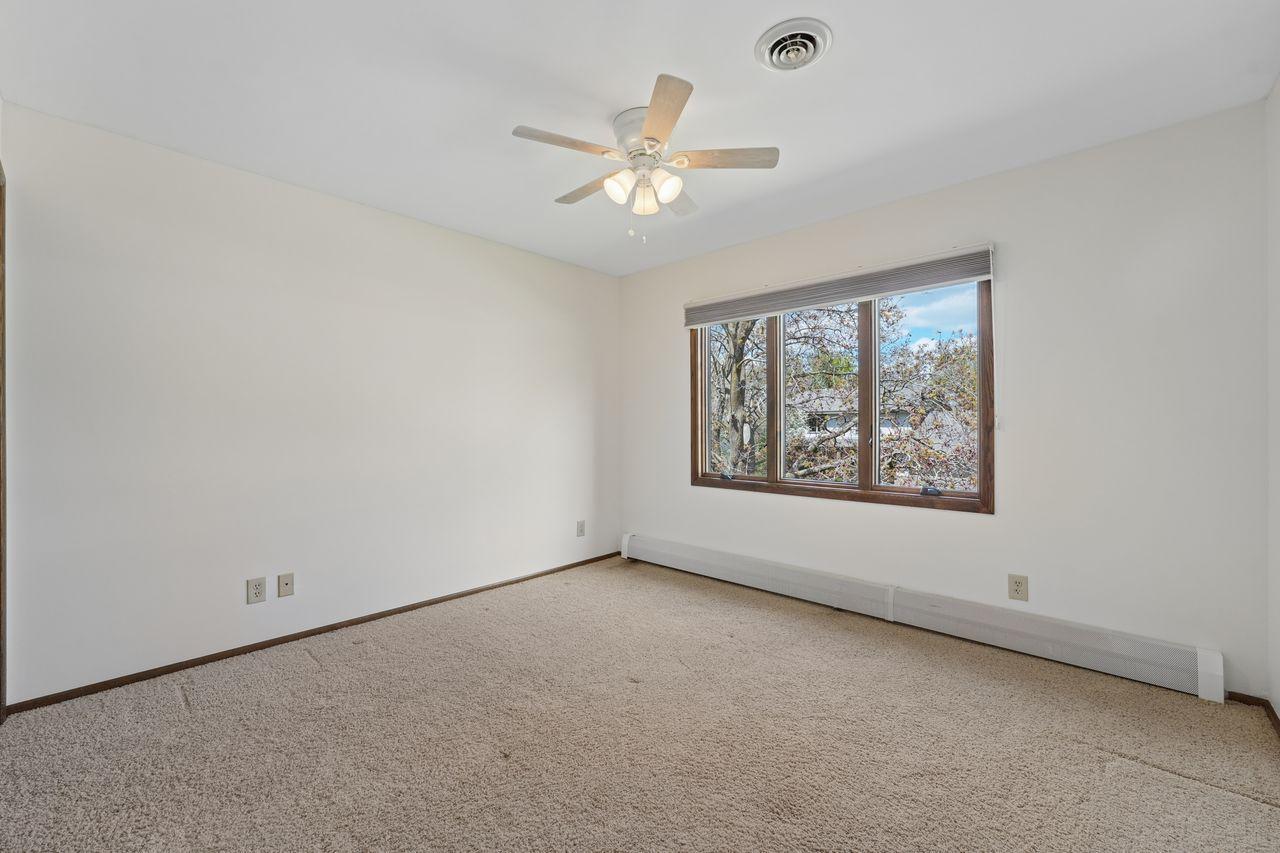 Upstairs bedroom, newer carpet, recently painted.
