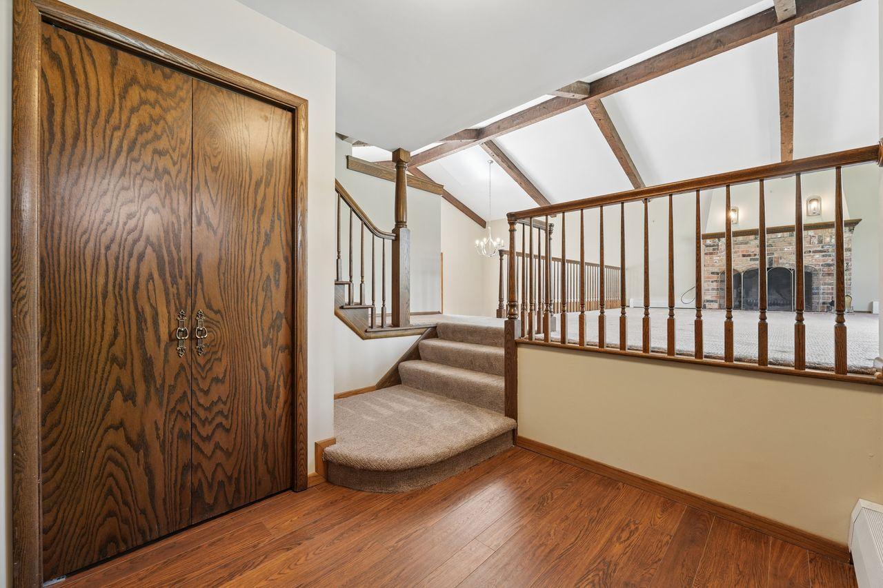 Open entryway with spacious closet, newer carpet throughout home.