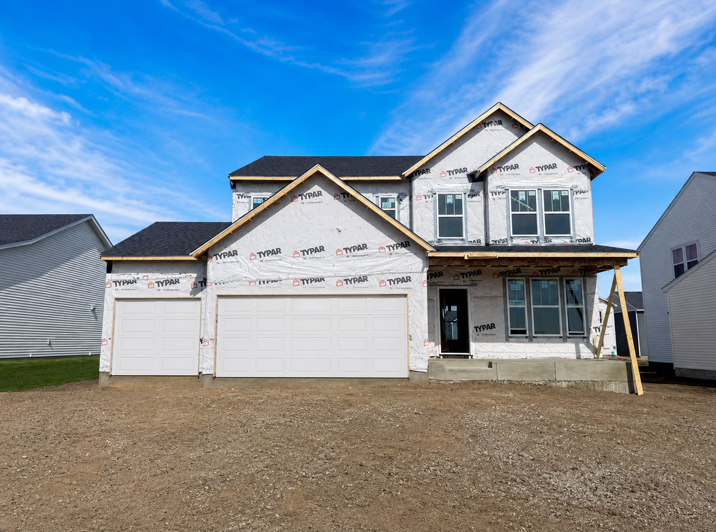 Exterior photo has been virtually enhanced to remove some construction materials.