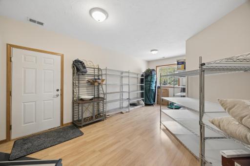 Large Spancrete garage entry/mudroom offering great space and convenience.