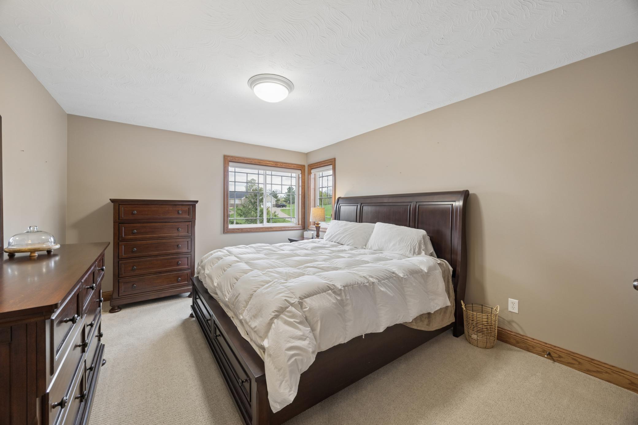 Bright third upper level bedroom.