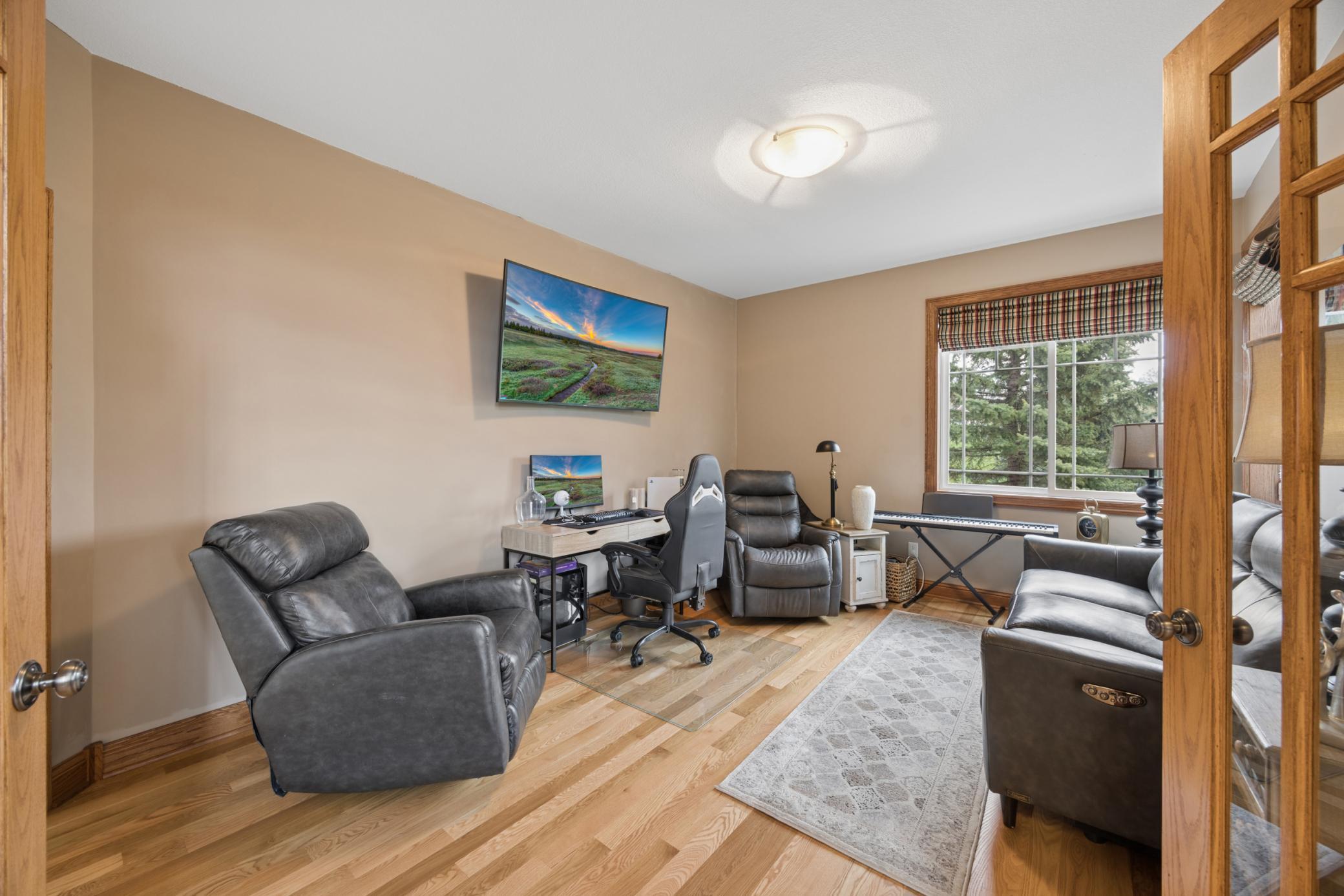 Additional office space with abundant natural light, ideal for a secondary workspace, study, or flex room.
