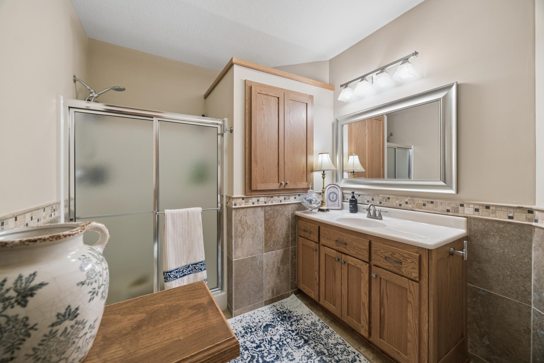 Convenient lower level 3/4 bathroom.