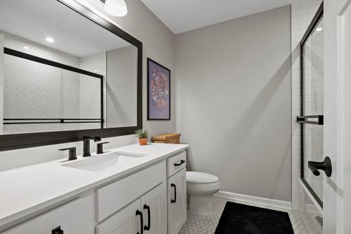 Full bathroom in the hallway on the upper level