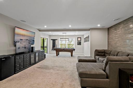 Room to hang out, play games, or enjoy the walk-out to the backyard
