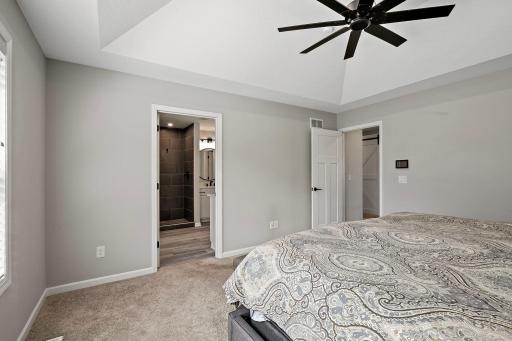 En-suite bathroom and walk-in closet is in the primary bedroom