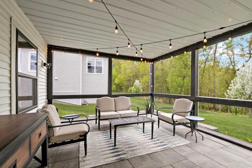 Step out to the three season porch and enjoy the time outside