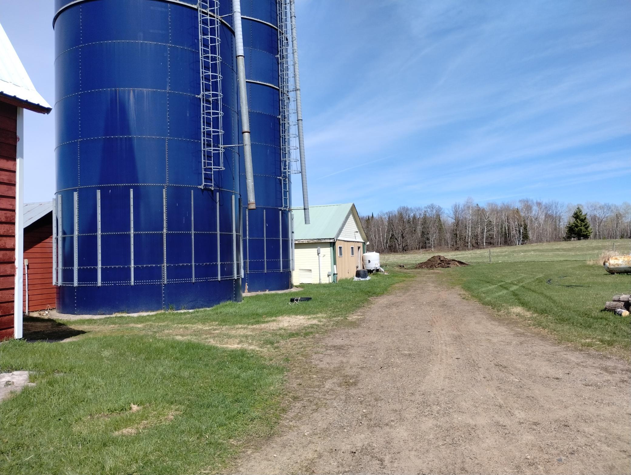 2 Harvestore silos & Milk room/parlor