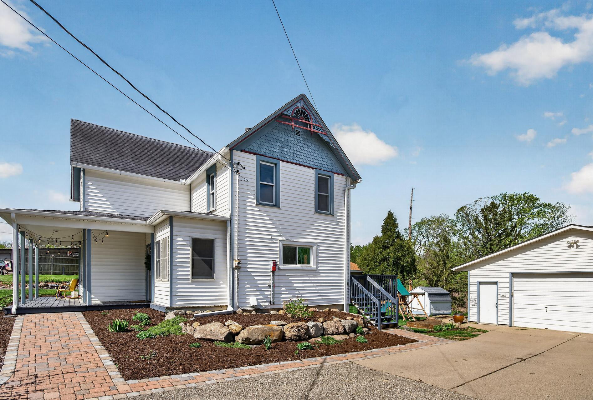 Great landscape around front and side of home