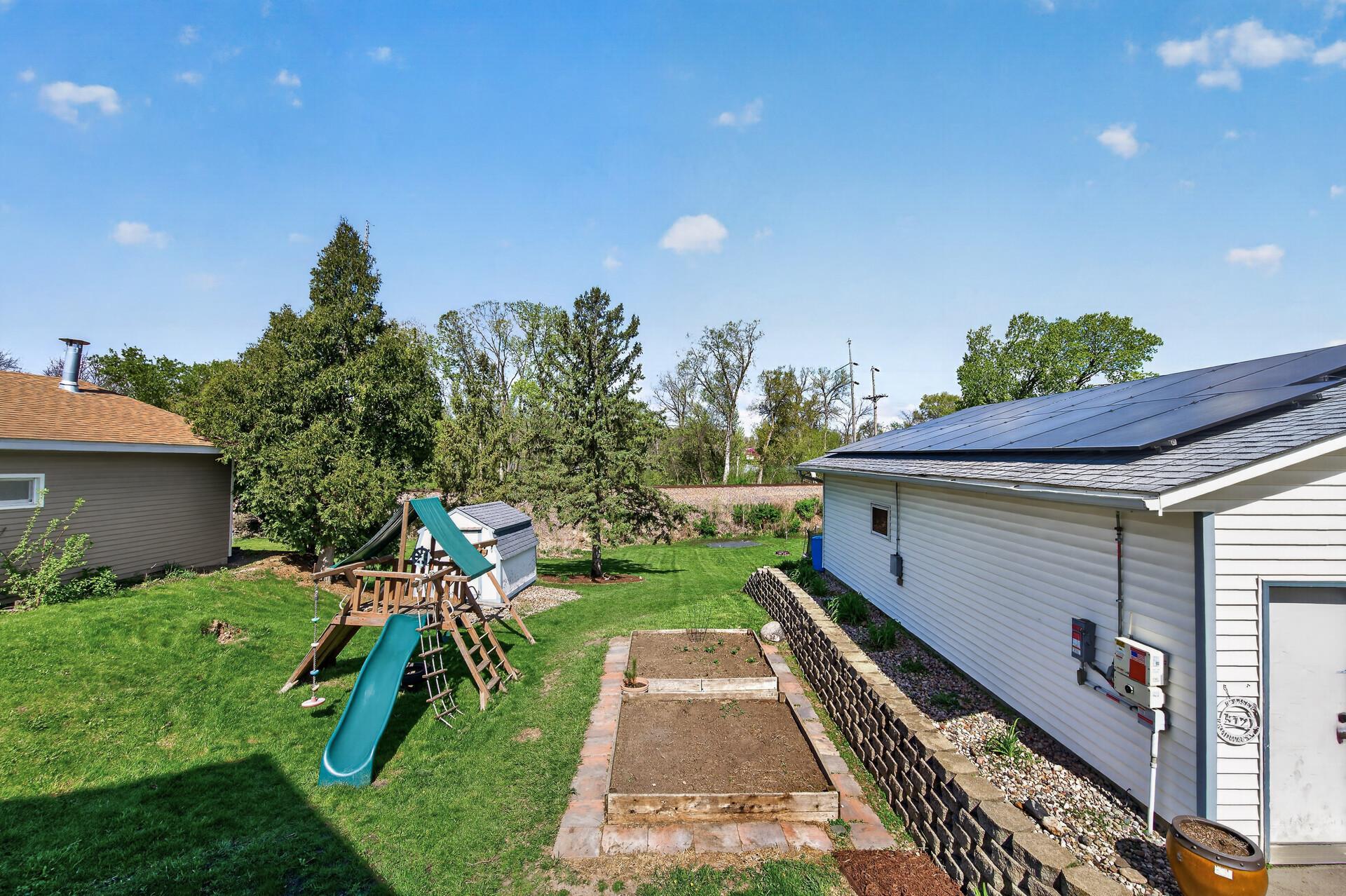 Backyard with room to play. Great space to have a garden too.