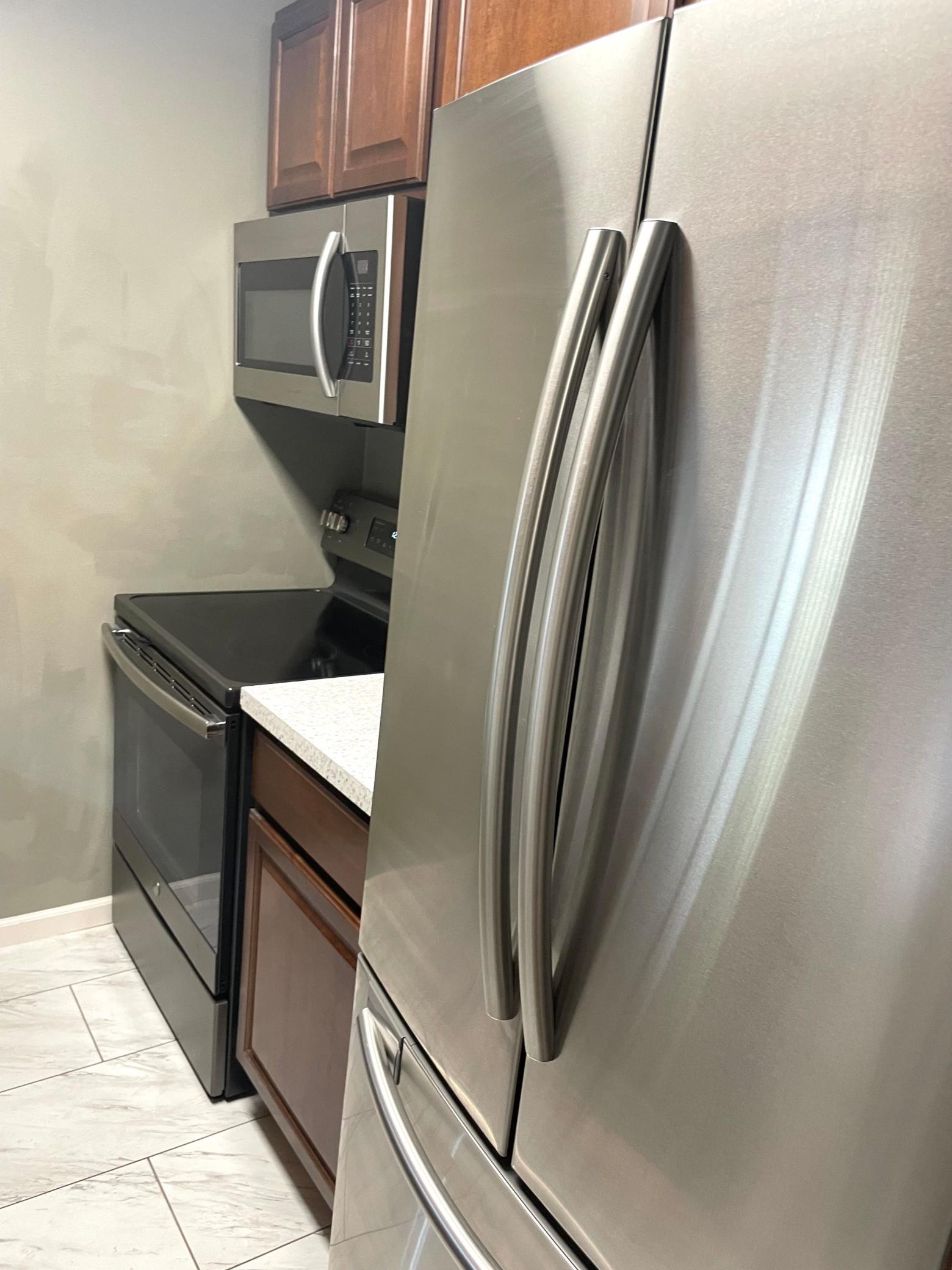 LVP flooring and Stainless Stell appliances