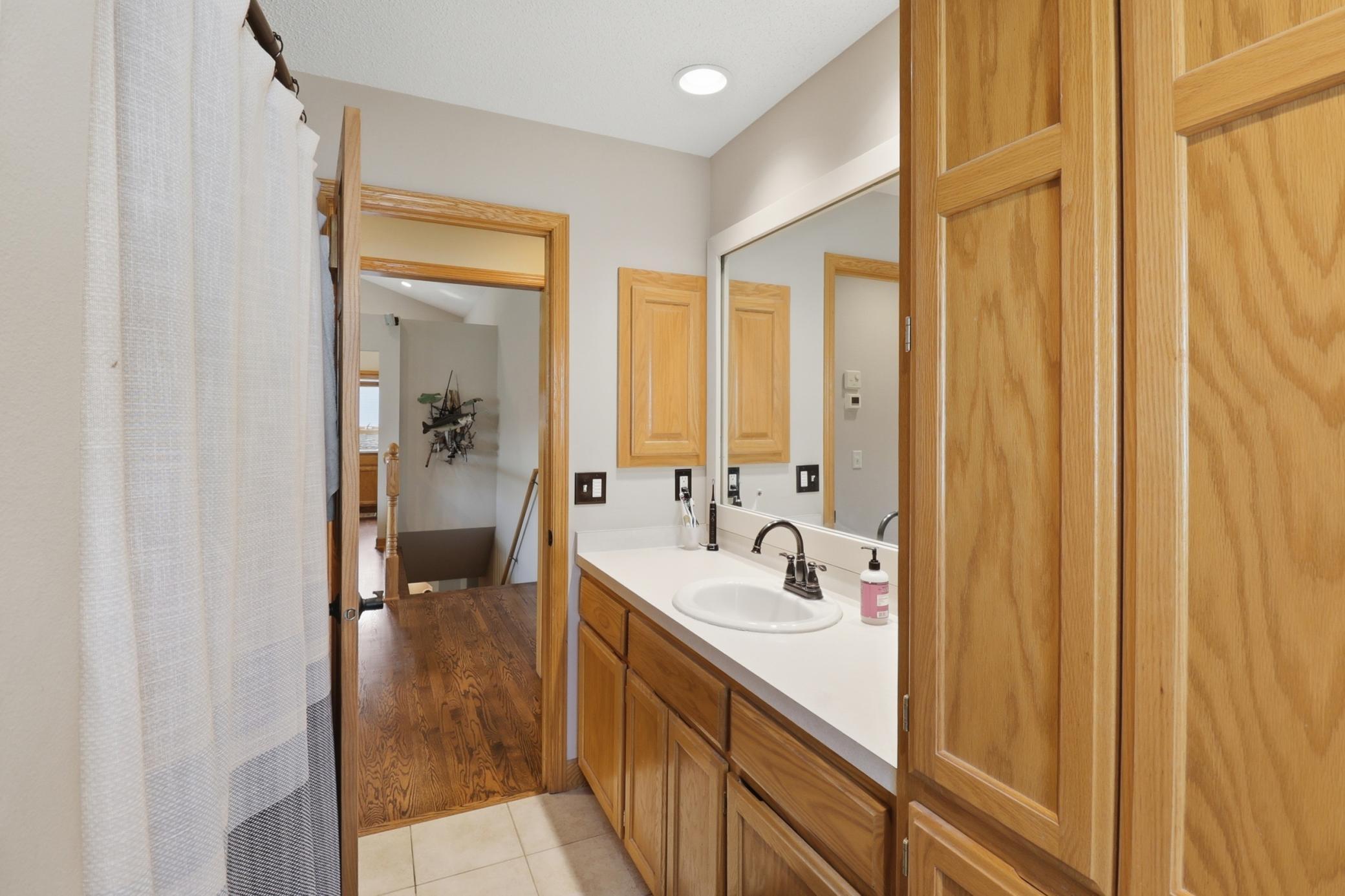 Primary Walk-Thru Bathroom