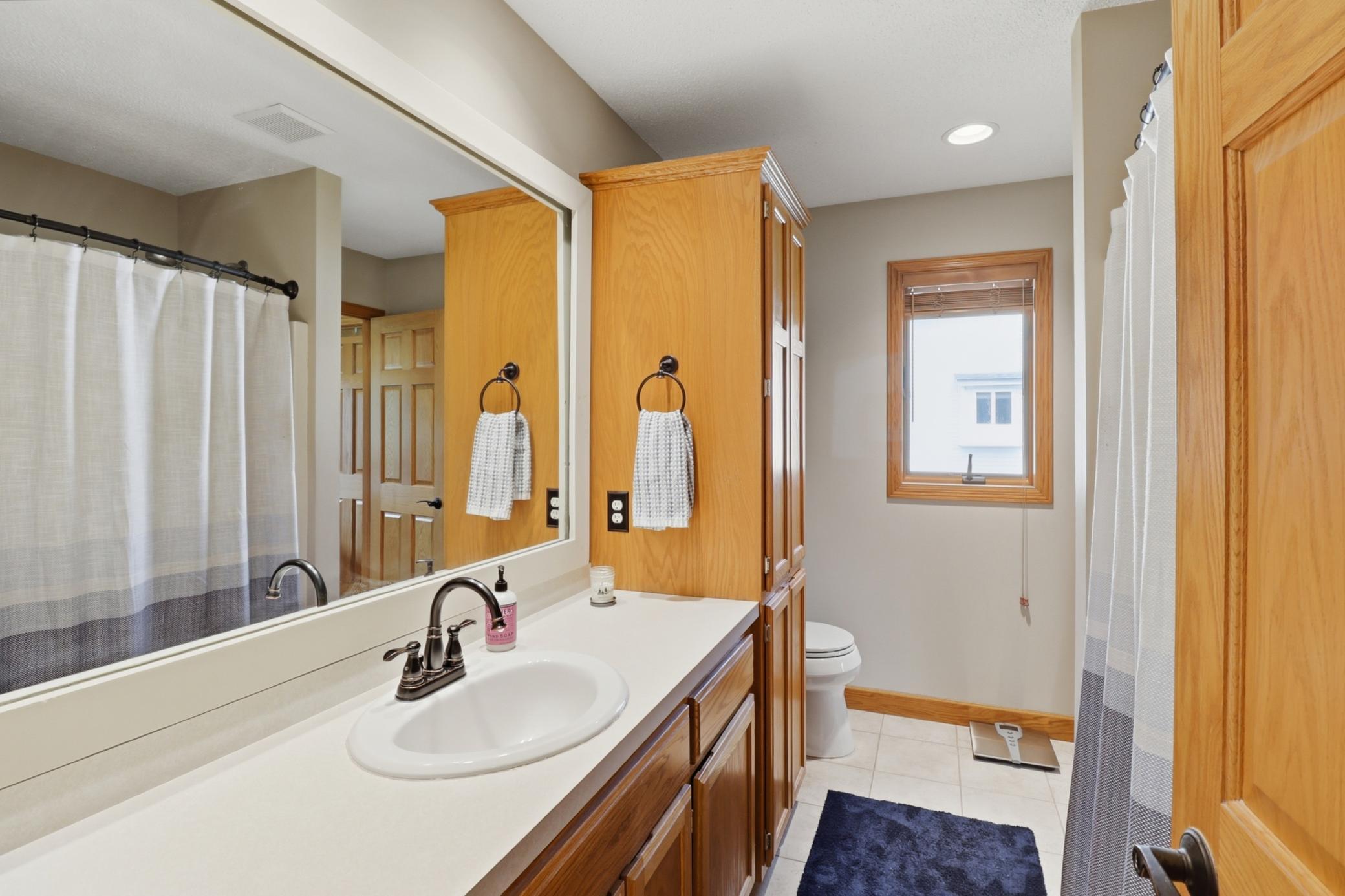 Primary Walk-Thru Bathroom