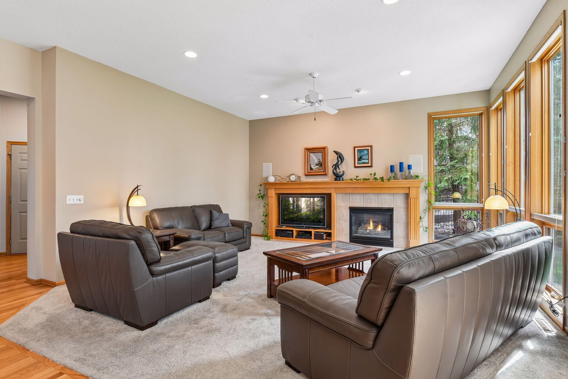 The family room is centered around a cozy gas fireplace.