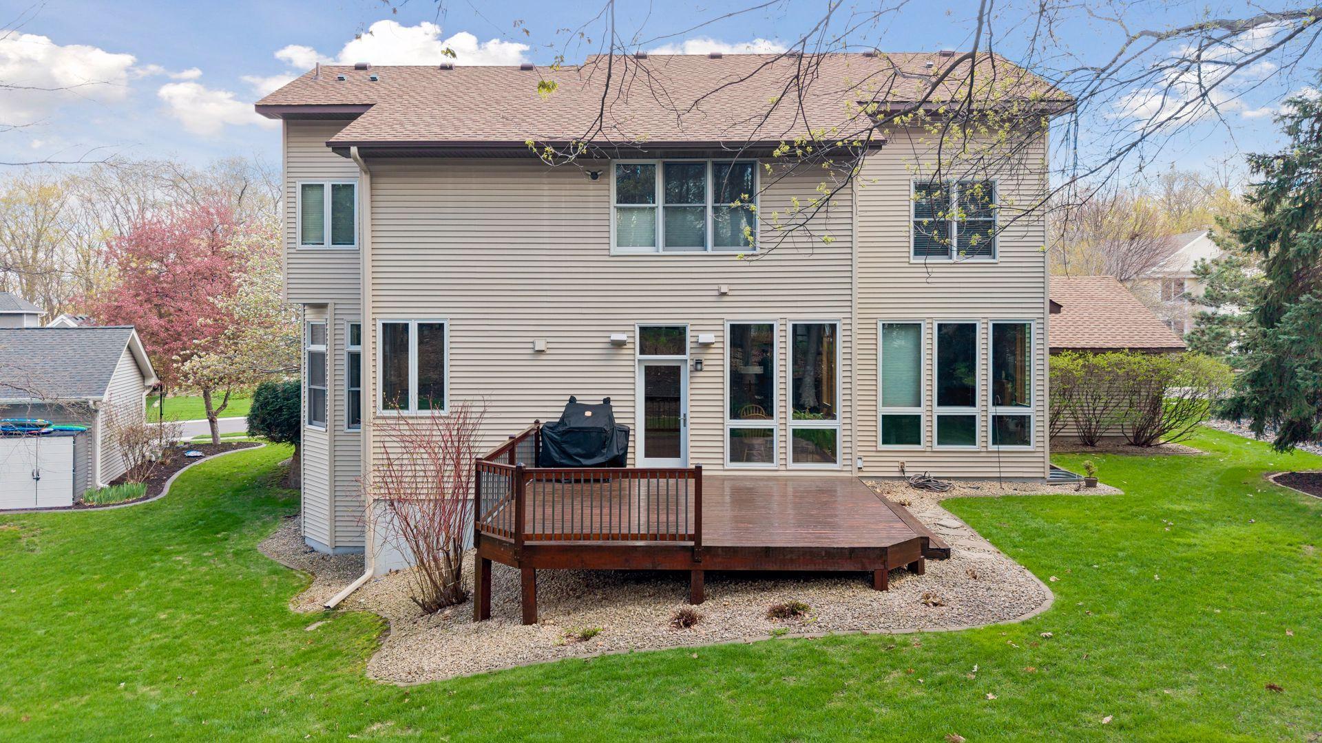 A rear deck just off the kitchen offers a great space for grilling and entertaining.