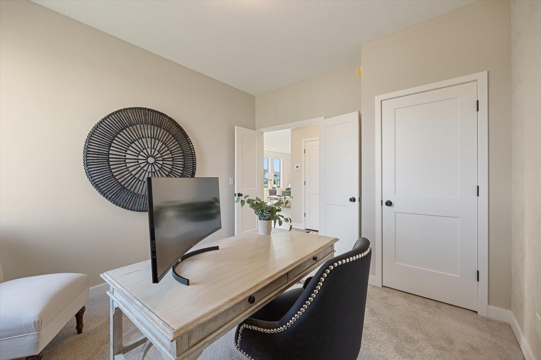 Main floor office/bedroom your choice