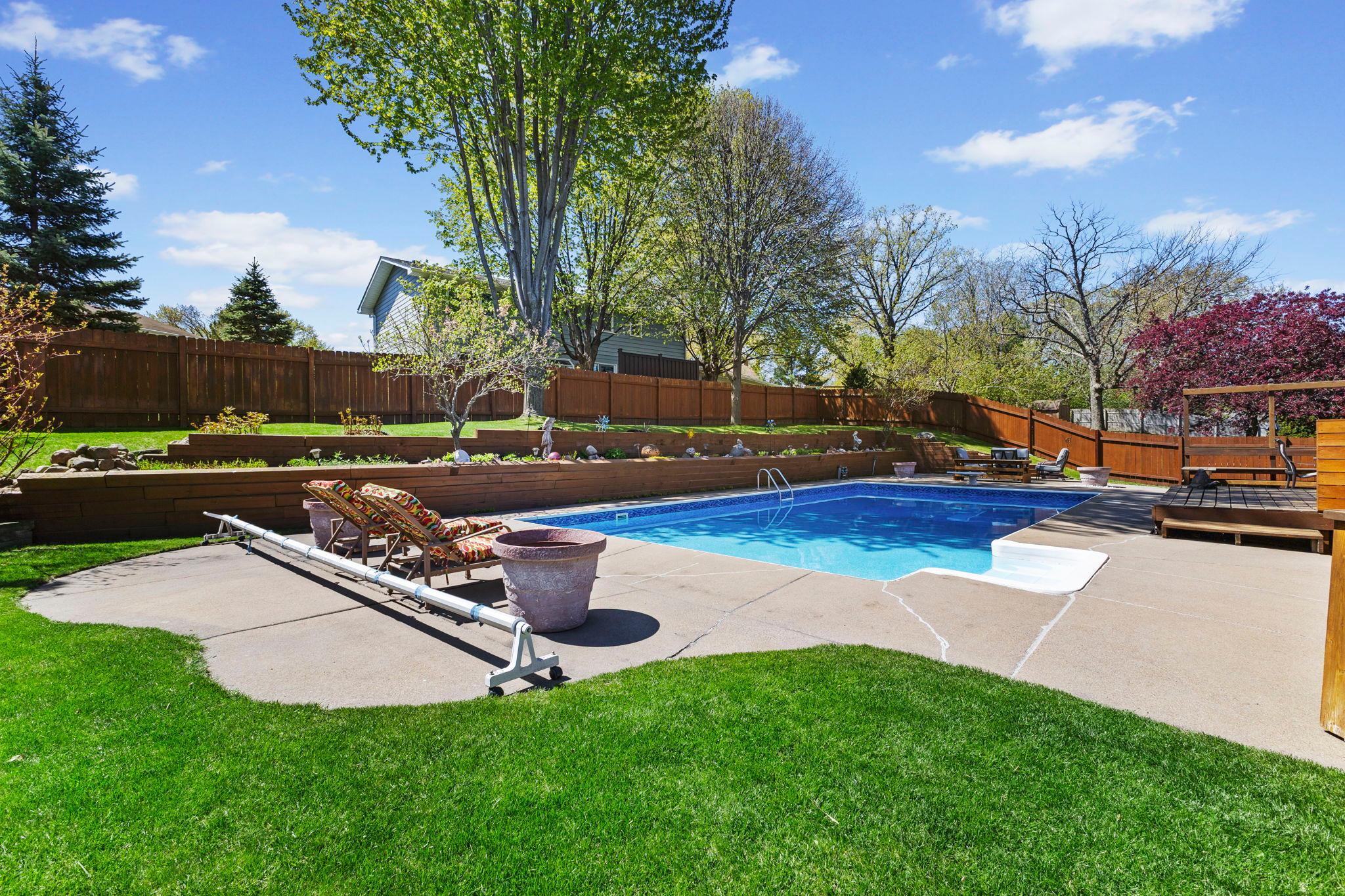 Unlike other poolside backyards, this one comes with massive room for entertainment and summer festivities!