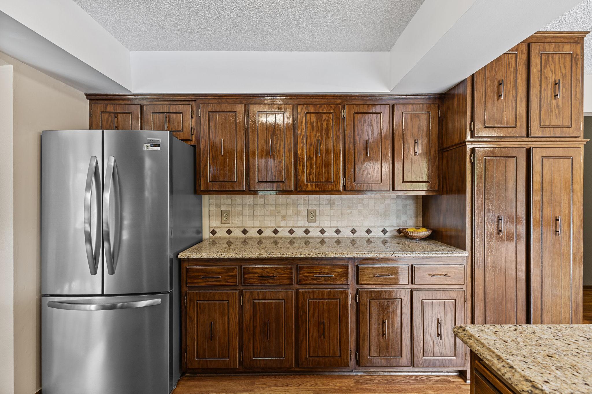 Offers an abundance of countertop space w/ a breakfast bar!