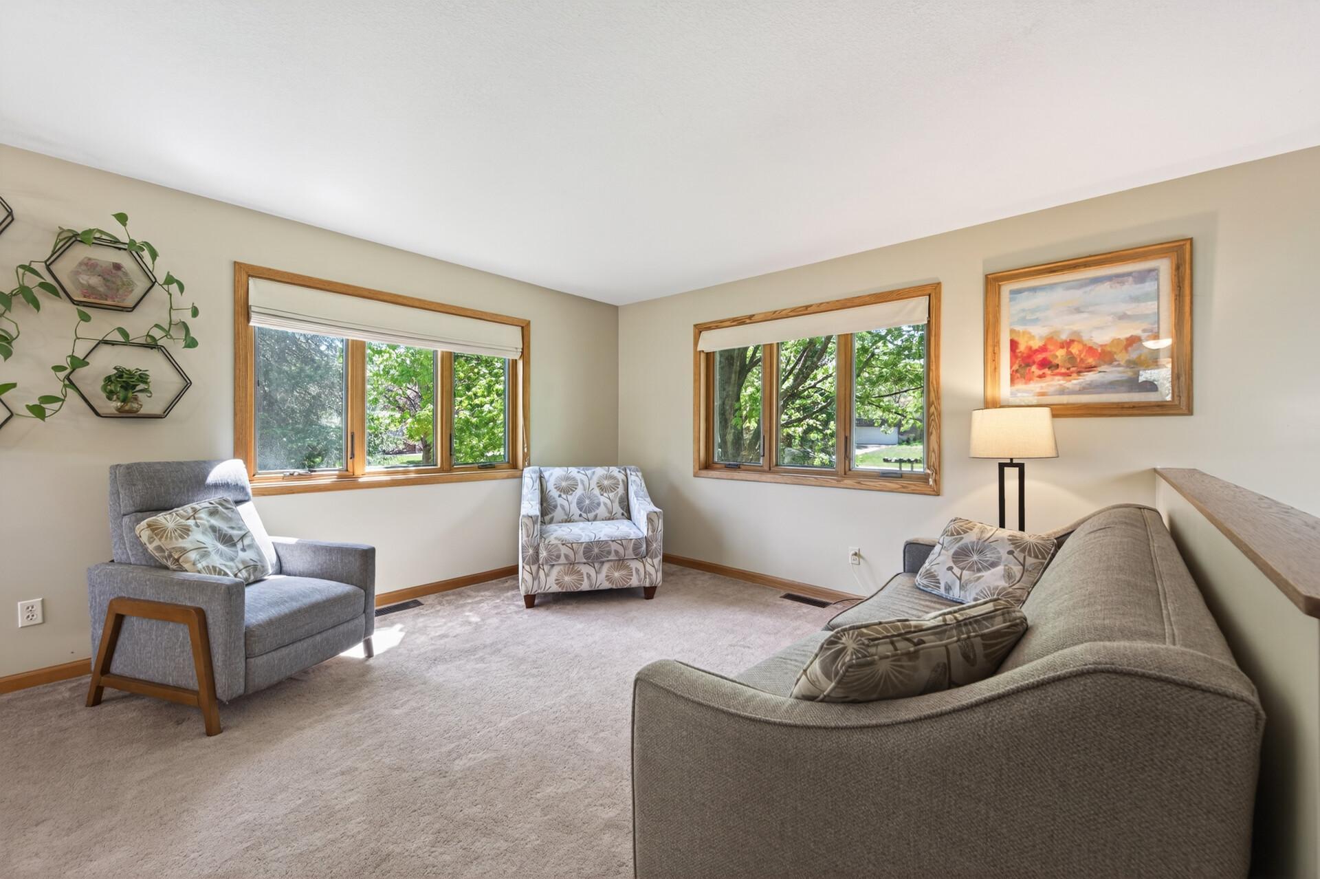 The light and breeze float through this living room!