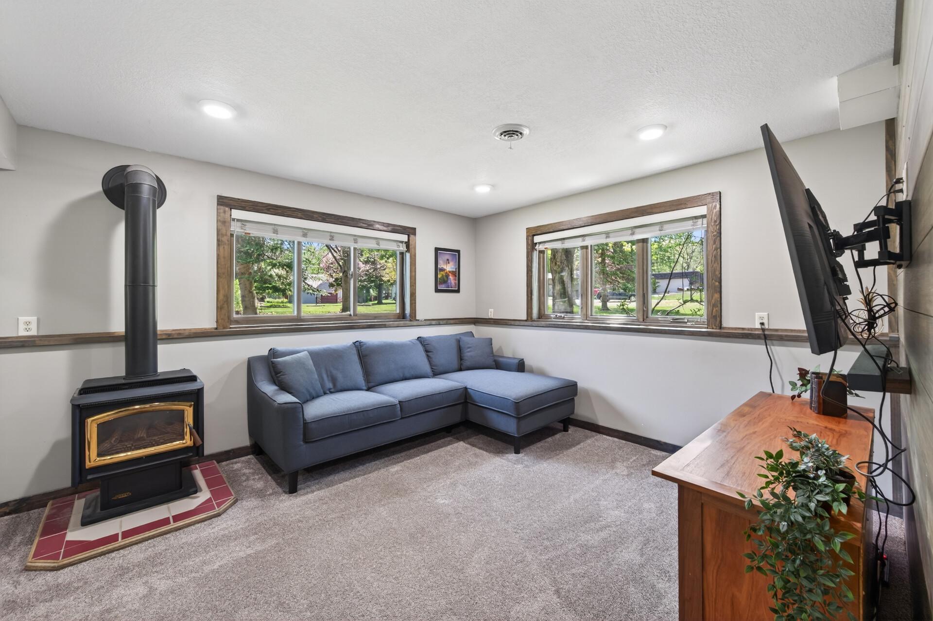 Family room downstairs with fireplace