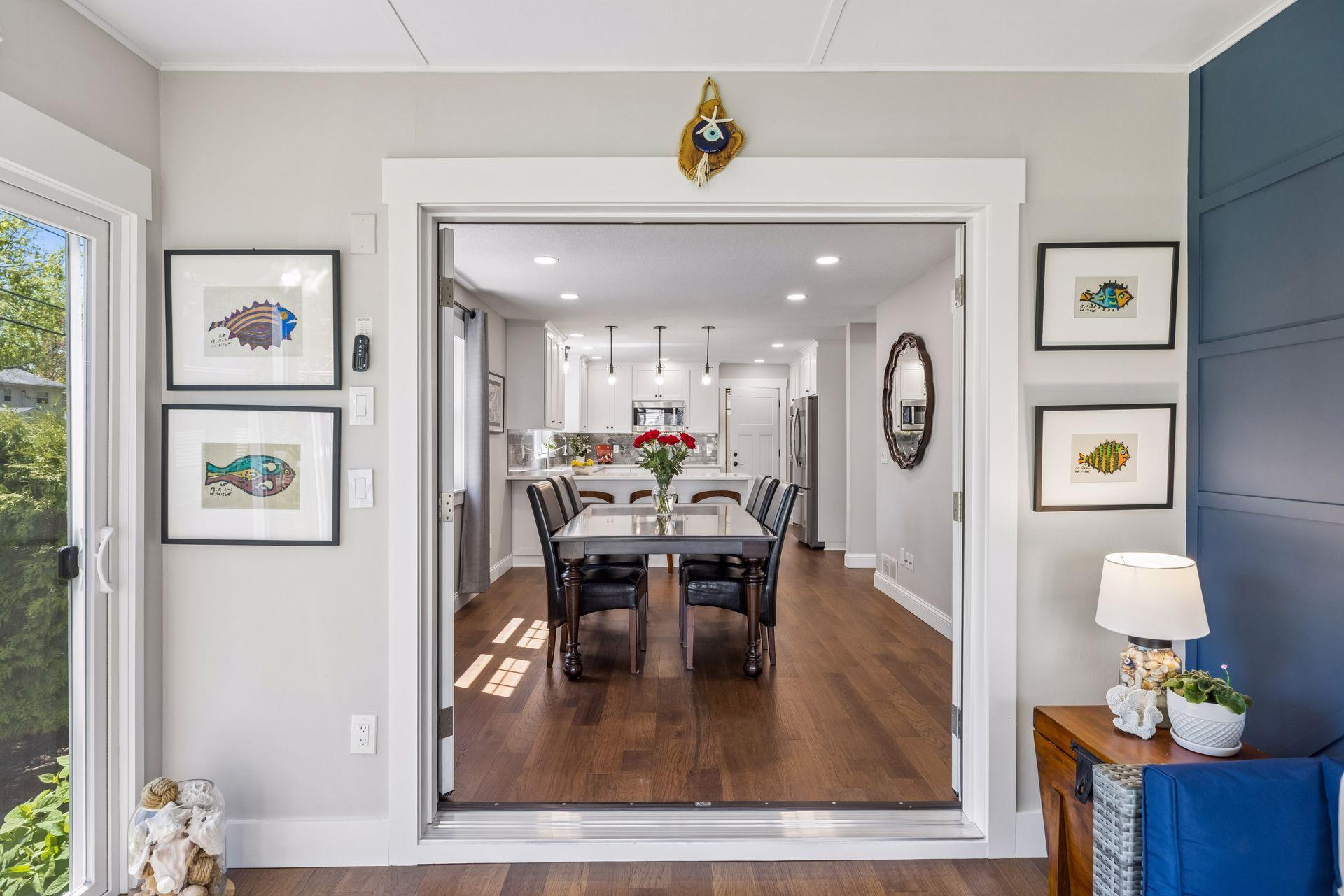 Open concept flow from kitchen to sunroom