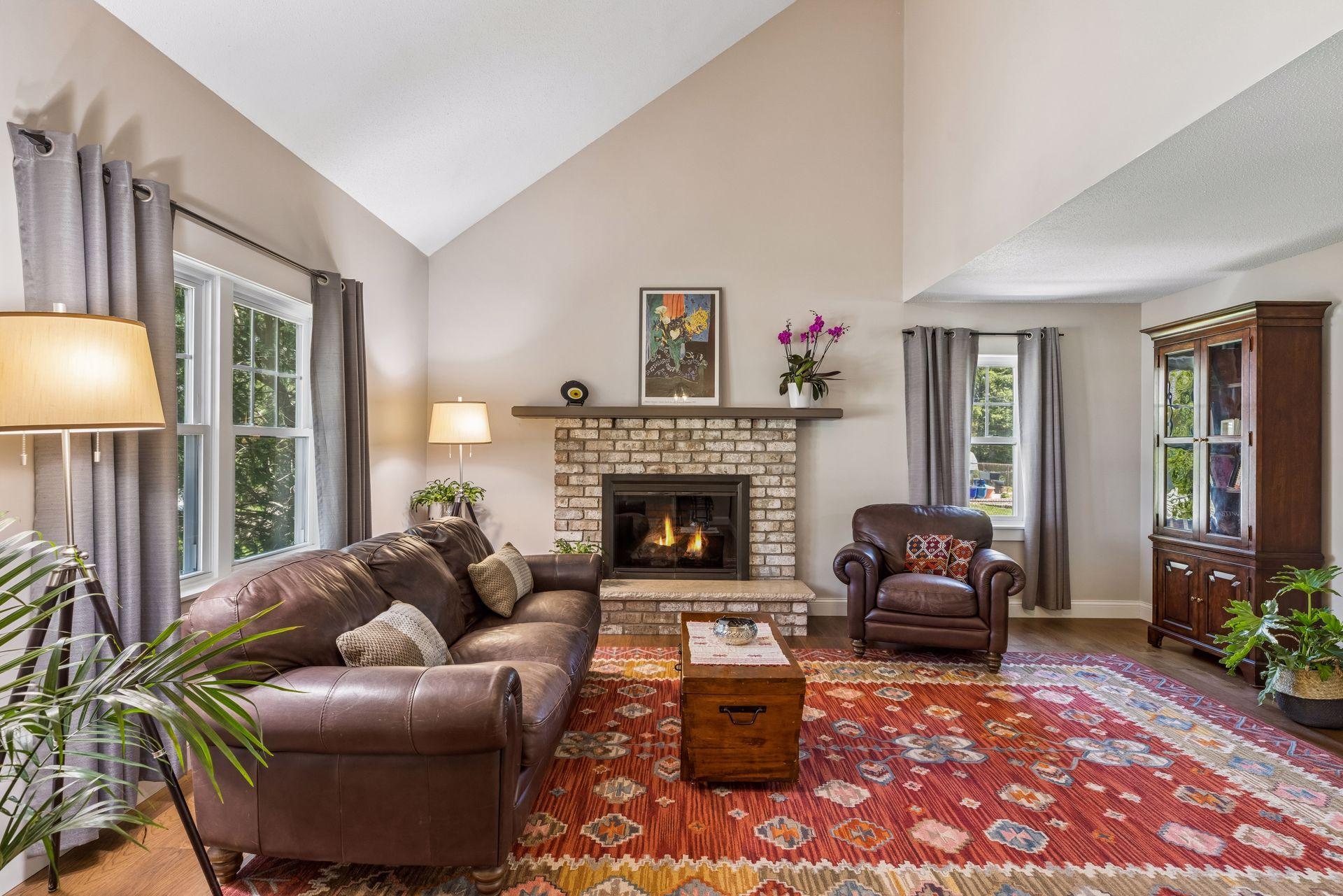 Large family room with fireplace and vaulted ceilings